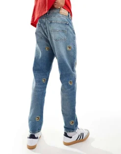 Tommy Jeans Isaac Relaxed Tapered Jeans In Mid Wash With Crest Details For Men Denim Medium -Tomeans Store 206859193 2