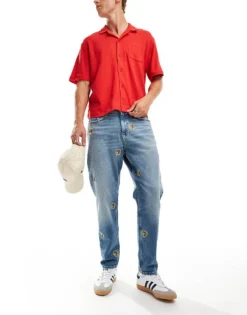 Tommy Jeans Isaac Relaxed Tapered Jeans In Mid Wash With Crest Details For Men Denim Medium -Tomeans Store 206859193 3